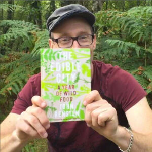 John holding book